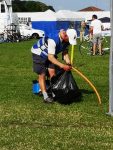 Volunteer with bins
