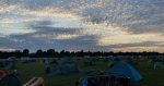 Photo by John Davies - sunset over the York Cycle Rally 2023 campsite - cropped