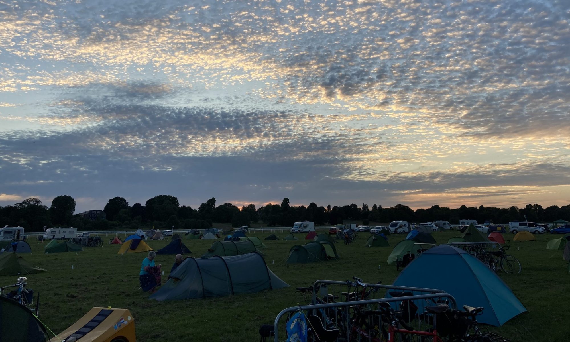 Photo by John Davies - sunset over the York Cycle Rally 2023 campsite - cropped